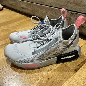 Adidas NASA sneakers.